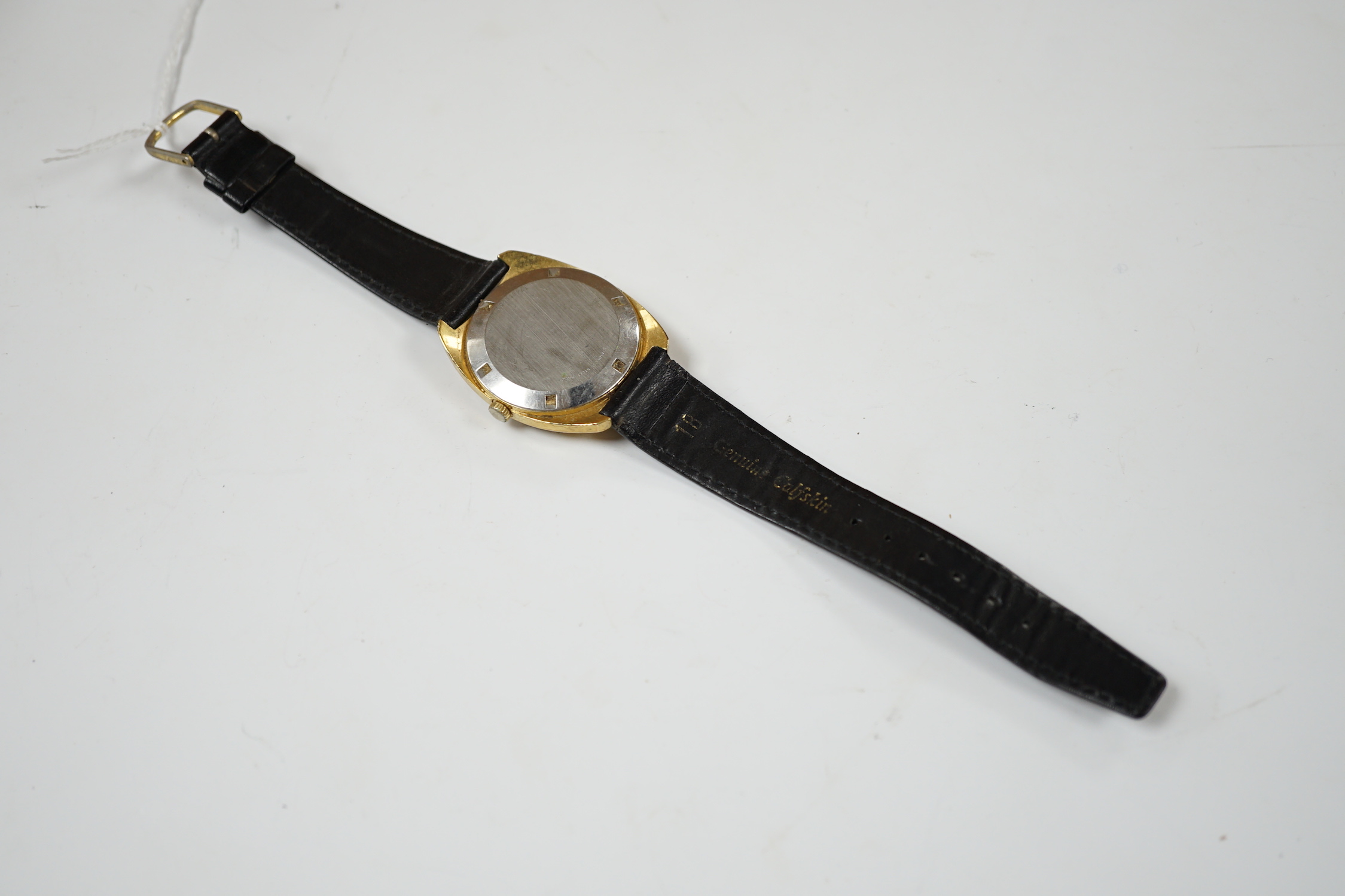 A gentleman's steel and gold plated Longines Conquest automatic wrist watch, with date aperture, on associated leather strap, case diameter 34mm.